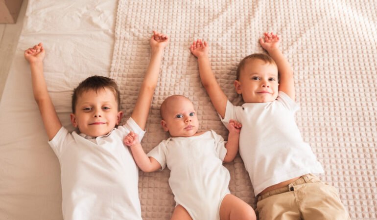 third baby after twins